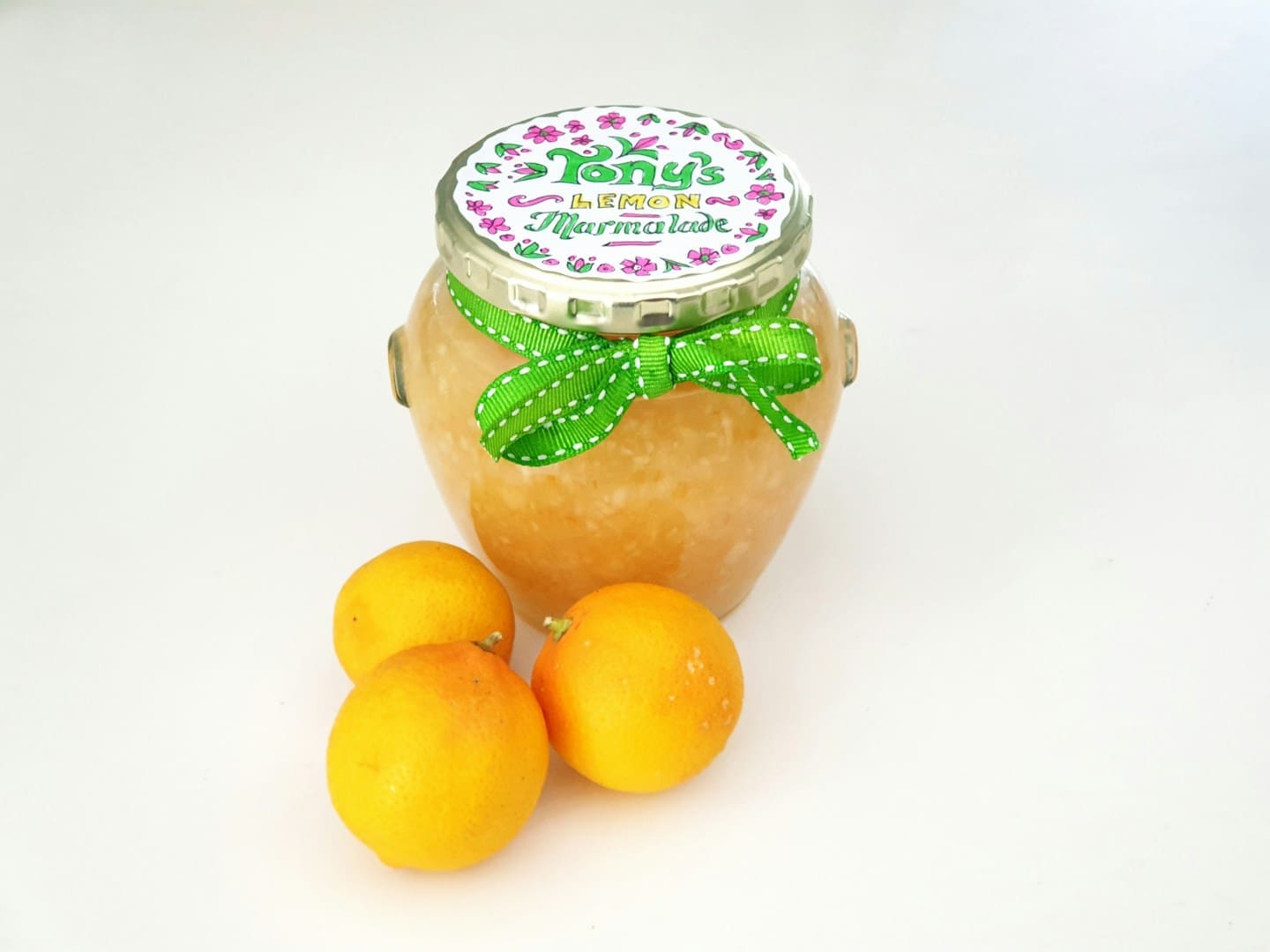 clear glass jar with yellow fruits