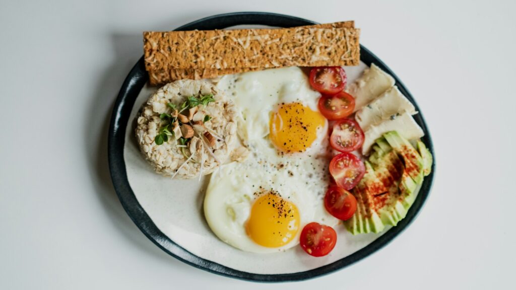 egg and vegetable salad on white ceramic plate